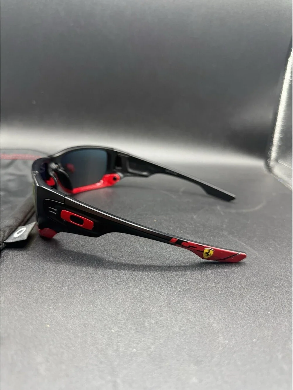 Oakley Style Switch Ferrari Matte Black/Ruby Iridium Lens OO9194-24
